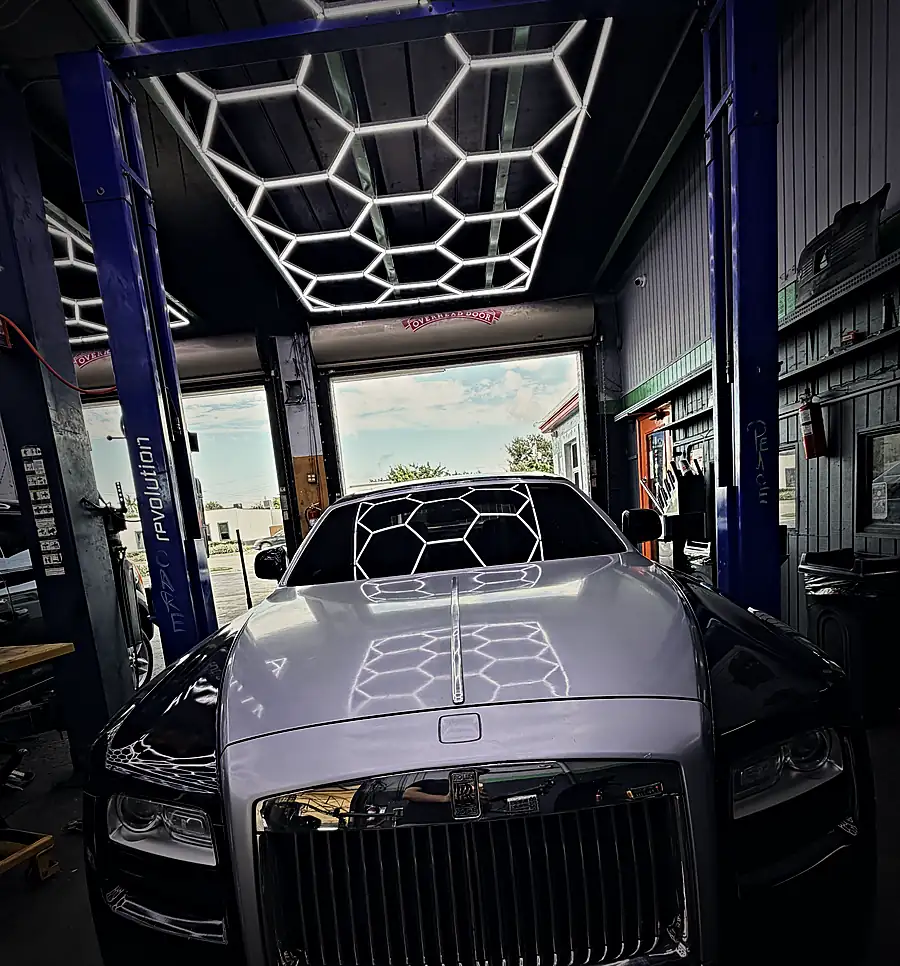 Rolls-Royce Ghost under the Prestige hexagon-light ceiling